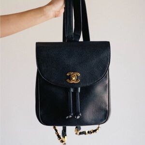 CHANEL Black Caviar Leather Drawstring Backpack with Gold CC
